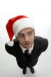 top view pose young businessman wearing santa cap