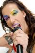 woman singing into microphone