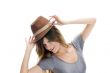 smart female wearing hat