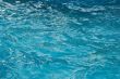 textured rippled deep blue water surface