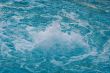 textured rippled deep blue water surface