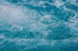 textured rippled deep blue water surface