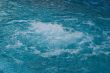 textured rippled deep blue water surface