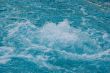 textured rippled deep blue water surface