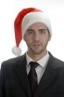 businessman with red santa hat