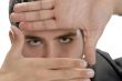 businessman making frame with fingers