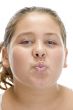 young girl making pout mouth