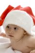 cute young baby wearing santa cap