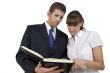 man and woman reading schdule