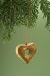 Christmas cookie hanging from fir branch