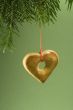 Christmas cookie hanging from fir branch