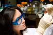 Scientist looking at test tube