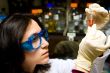 Scientist looking at test tube