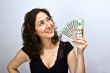 Woman waving money