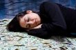 Woman dreaming about money