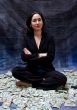 Woman sitting in money