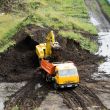The dredge and the dumper truck