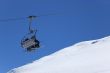 Chair lift at ski resort. Winter vacations