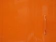 slick orange metal door