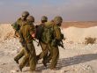 Israeli soldiers excersice in a desert