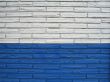 white and blue brick building