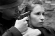 man threatens the woman with a pistol