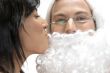 woman kissing to santa man