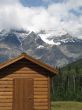cottage at the foot of mountains