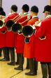 musicians playing on hunting horns