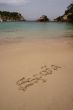 España written on a beach