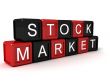 stock market text on building blocks