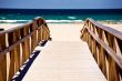 Wooden stairs on deserted beach dunes