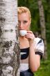 Beautiful young woman and coffee