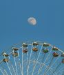 Big Ferris wheel in front of the moon