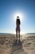 woman touching the sun