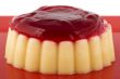 Vanilla pudding with strawberry sauce