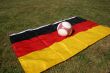 Soccer ball in front of the german flag