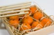 tangerines with straw