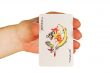  womanish hand holds a playing cards
