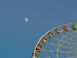 Big Ferris wheel in front of the moon
