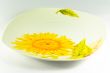 Plate with sunflower on white
