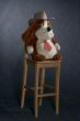 chair and toy with western hat