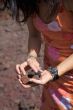 volcanic stones on her hands