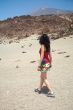 woman watching a volcano