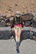 woman sitting on stone