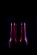 red beer bottles isolated on a black background