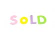 sold in colorfull letters