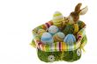 Easter bunny in the nest with eggs