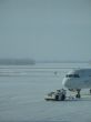 a towed airplane in the white snow