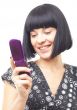 smiling woman with mobile phone